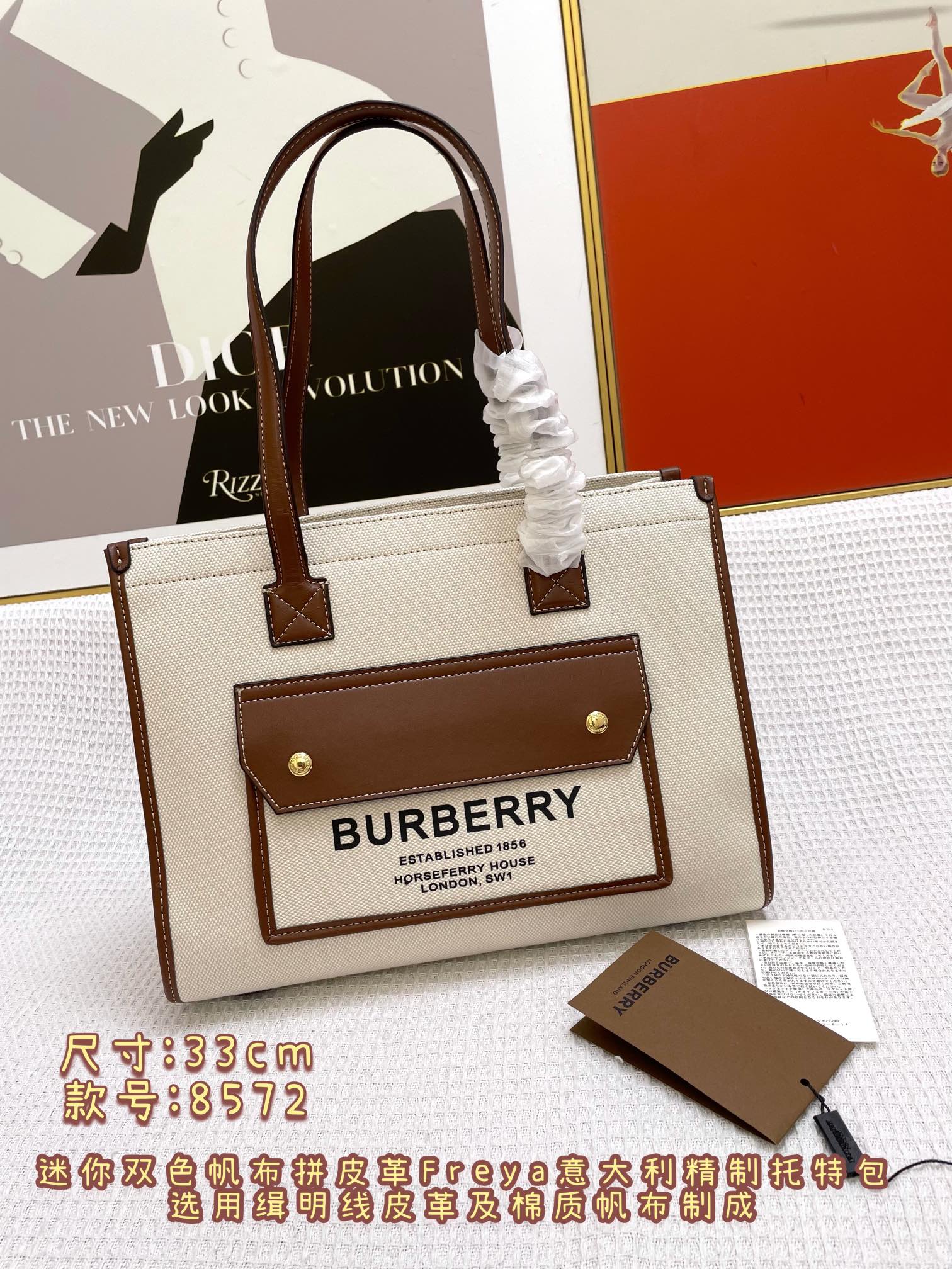 BURBERRY HANDBAG Brown with beige accents.