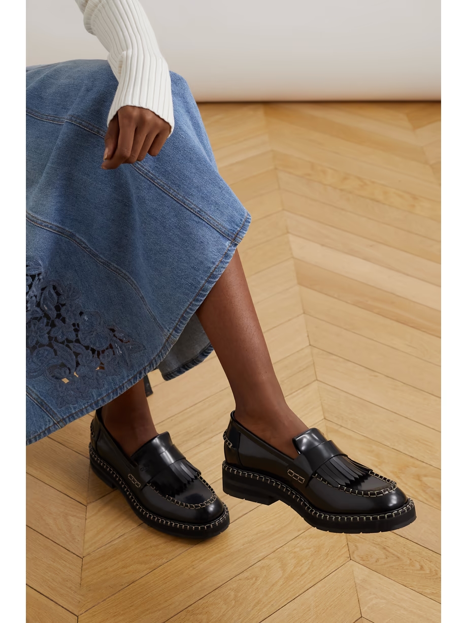 Noua fringed whipstitched leather loafers