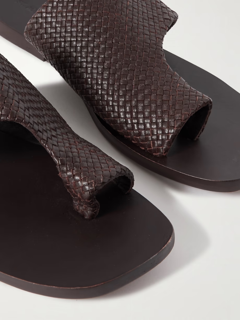 Asymmetric woven leather slides