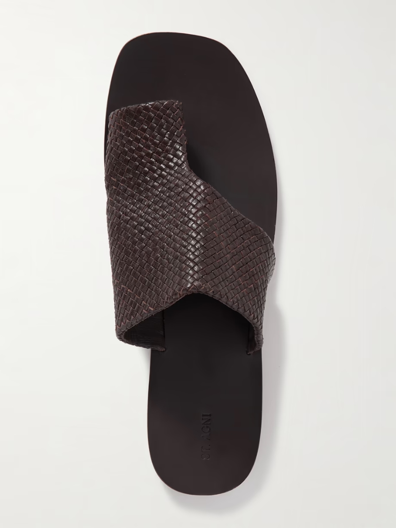 Asymmetric woven leather slides