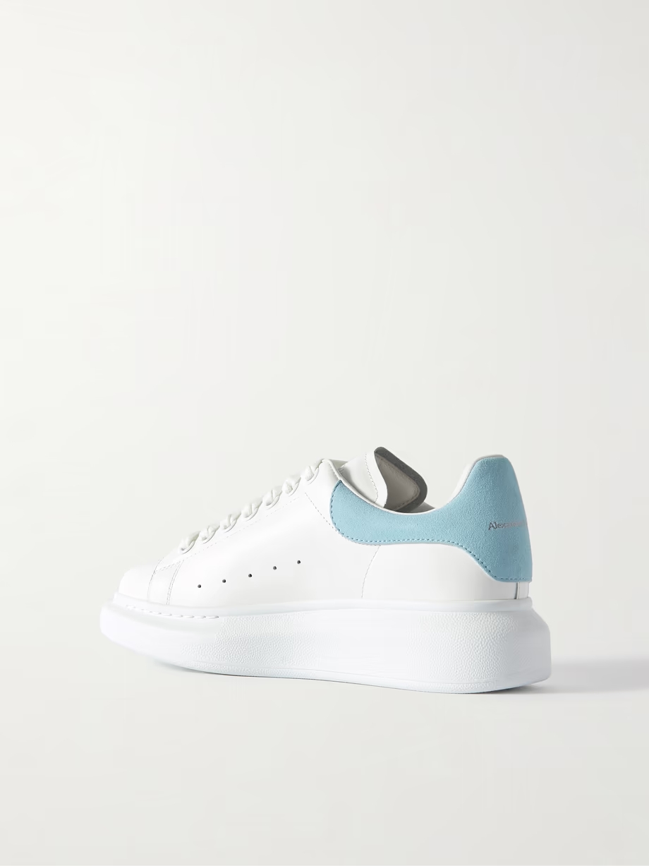 Suede-trimmed leather exaggerated-sole sneakers