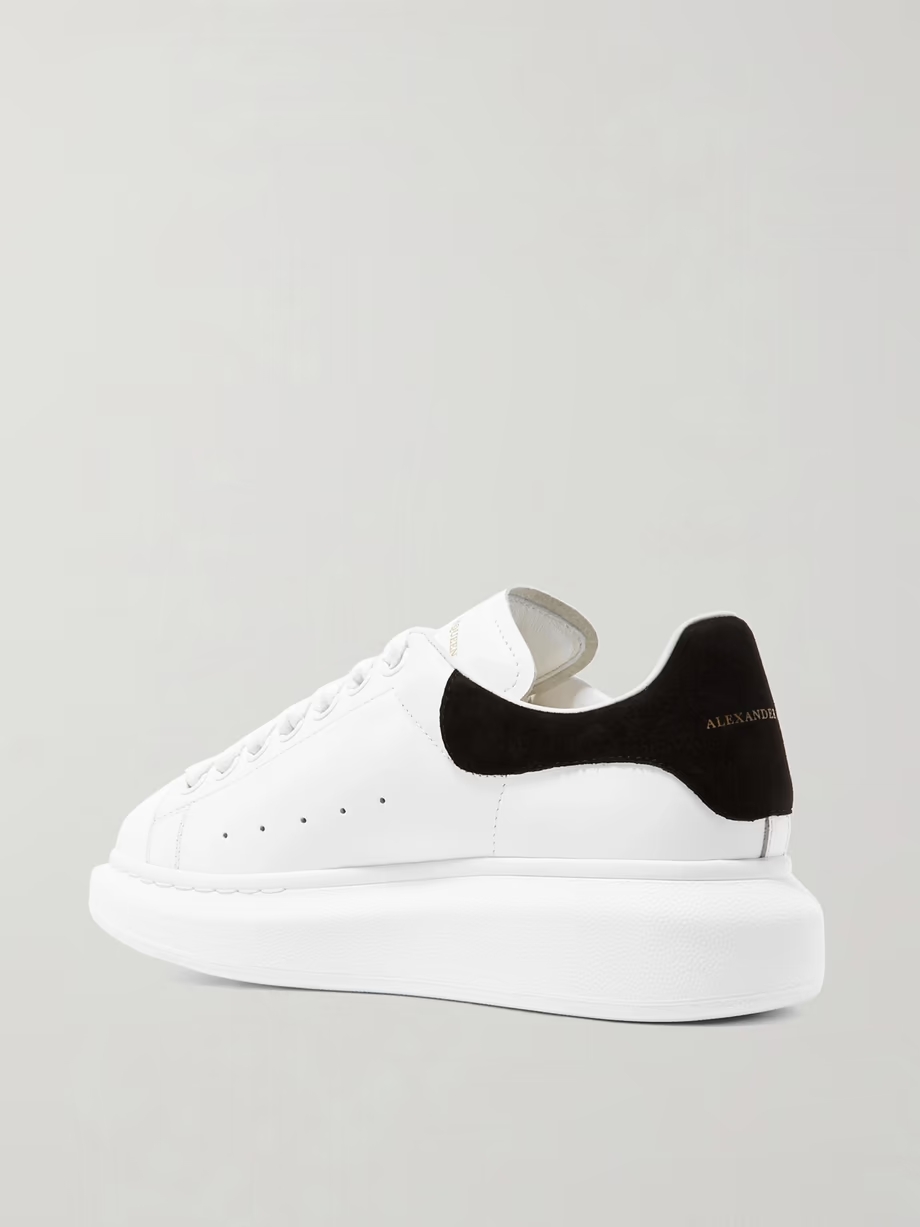 Suede-trimmed leather exaggerated-sole sneakers